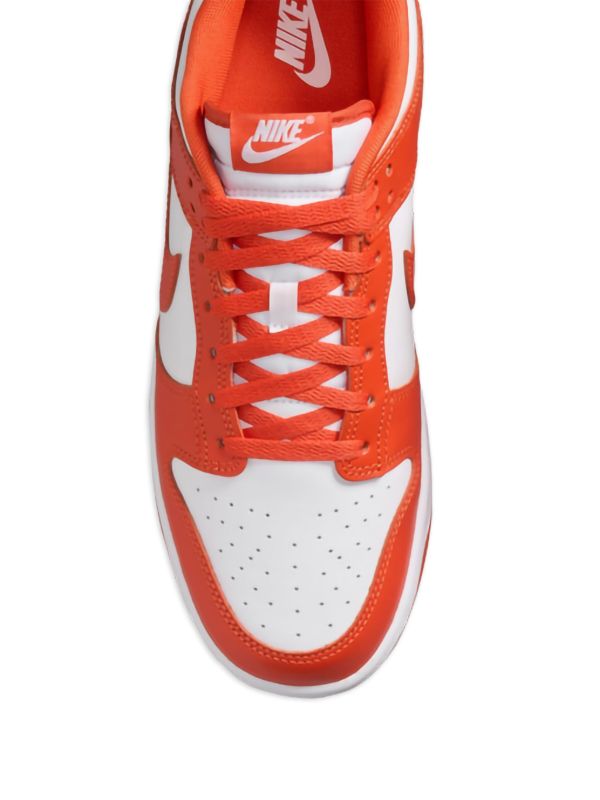 Nike Dunk Low SP "Syracuse" sneakers featuring a vibrant orange and white leather colorway.