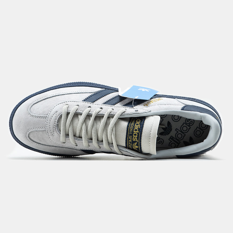 Adidas Originals Handball Spezial in a Grey and Navy colorway.