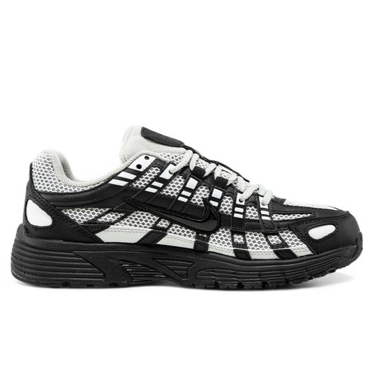 Nike P-6000 sneaker in a black and white colorway, inspired by early 2000s running style.