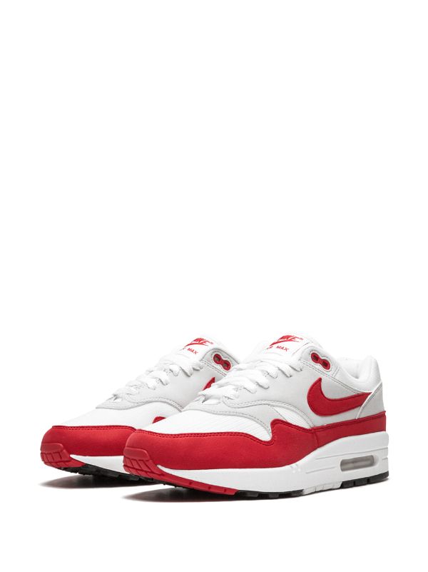 Nike Air Max 1 sneakers, specifically featuring the "University Red"