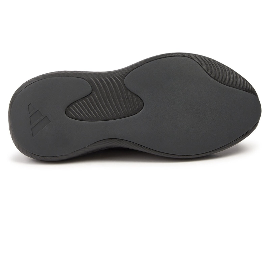 Adidas Purechill Slides in Core Black, featuring a sleek, all-black design with a textured upper and EVA midsole.