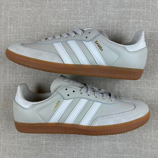 Adidas Samba OG sneakers in a light grey color with a classic gum sole.
