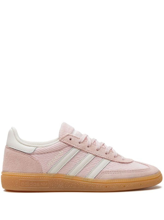 Adidas Handball Spezial sneakers in a sandy pink color with a corduroy upper.