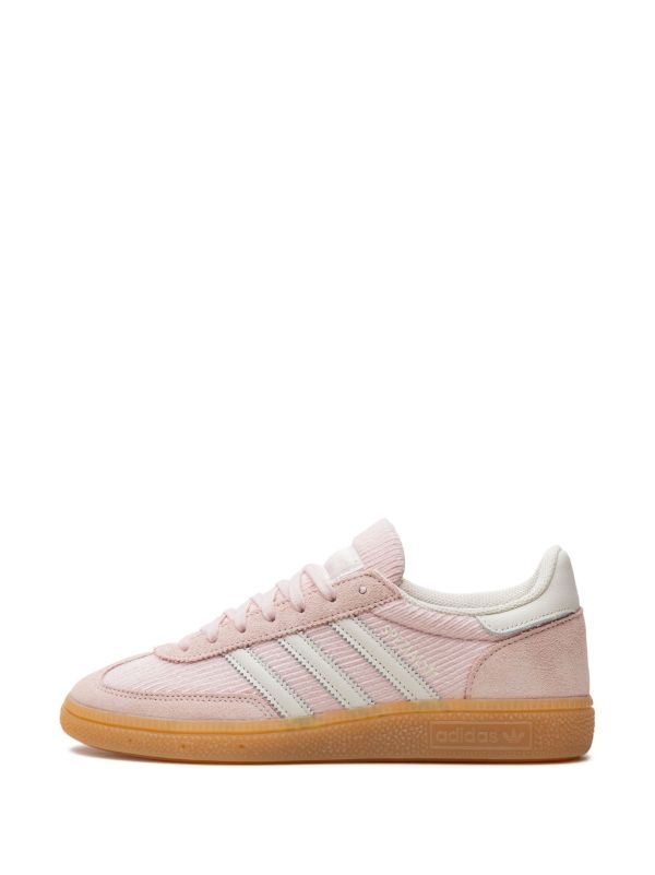 Adidas Handball Spezial sneakers in a sandy pink color with a corduroy upper.