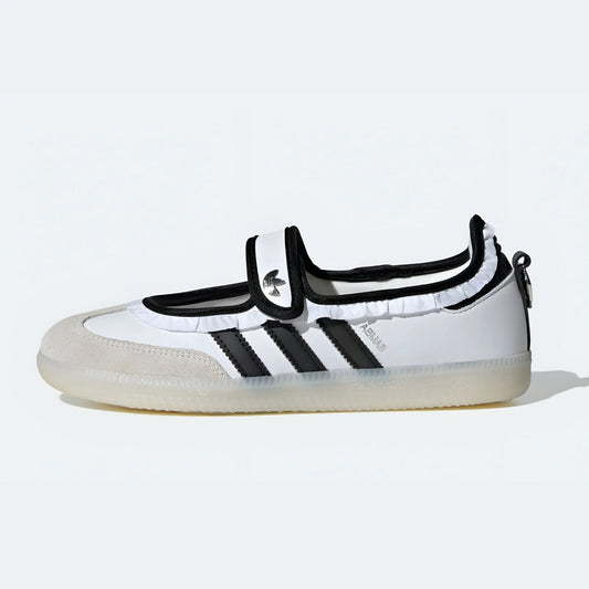 Adidas Samba Jane shoes in a white and black colorway, featuring a unique ruffle trim detail.