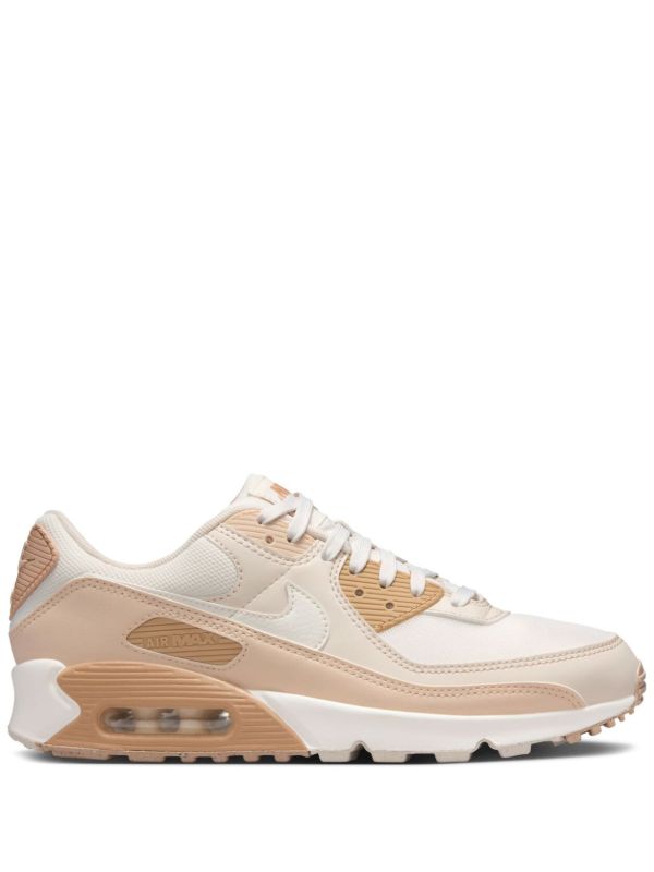 Nike Air Max 90 sneakers in a neutral beige and "Coconut Milk" colorway.