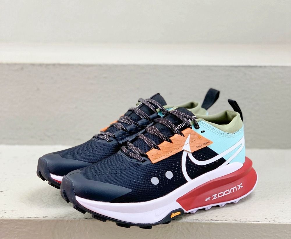 Nike Zegama 2 trail-running shoes featuring ZoomX foam cushioning and a rugged Vibram outsole.