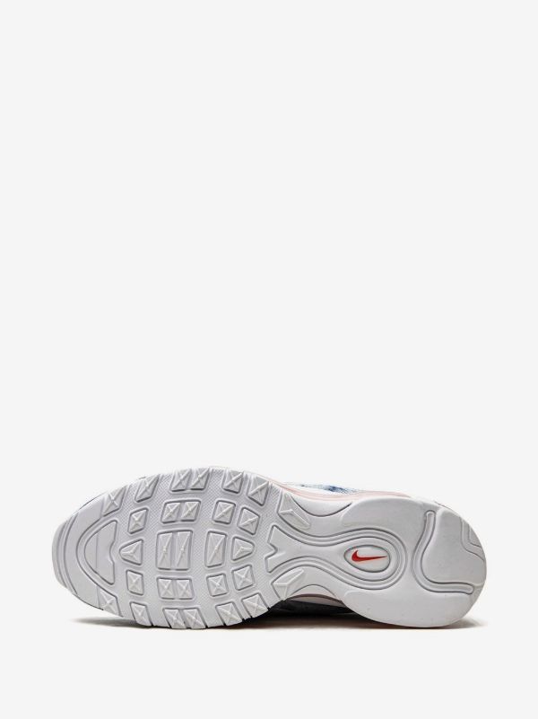 Nike Air Max 97 "Washed Denim Pack" sneakers, recognizable by their unique blue denim texture paired with bright red accents and a white sole.
