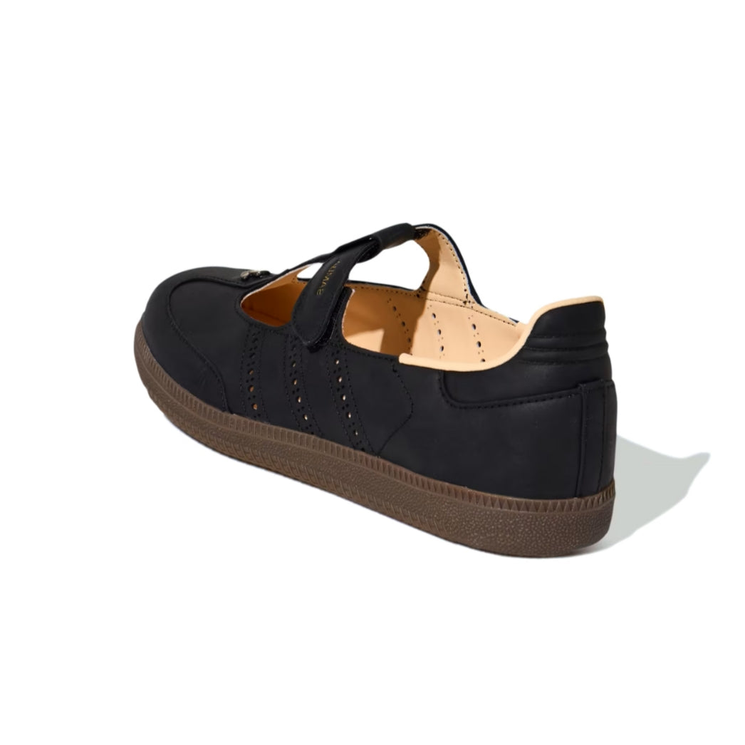 Adidas Samba Jane sneakers in Core Black, featuring a distinctive slip-on Mary Jane strap design.