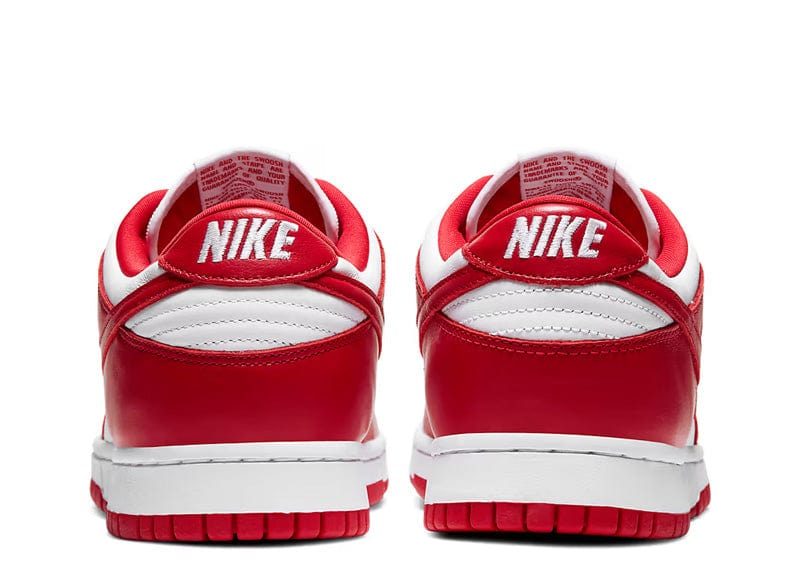 Nike Dunk Low SP "St. John's" sneakers featuring a bold white and university red leather upper.