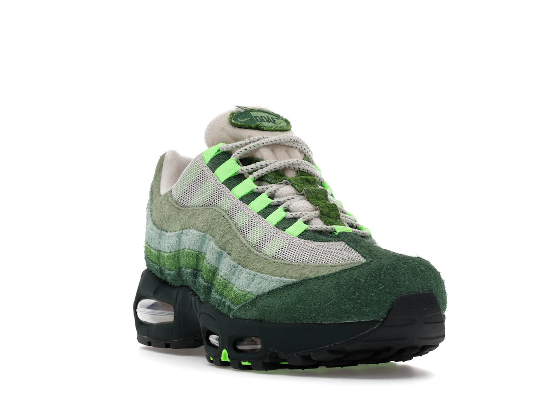 Nike Air Max 95 "Ducks of a Feather" sneakers in "The Woods" colorway, featuring shaggy green suede and moss-like overlays.