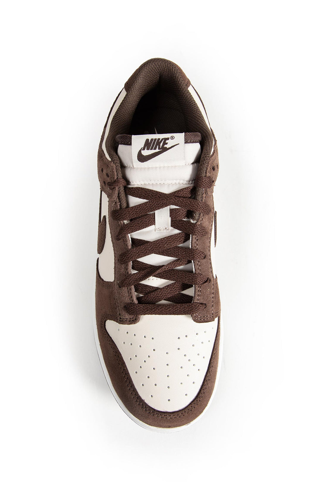 Nike Dunk Low suede-panelled sneakers in a brown and beige colorway featuring a signature swoosh logo