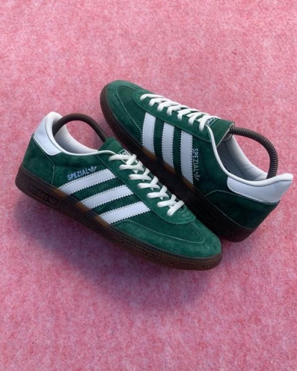 Adidas Handball Spezial sneakers in a green colorway with white stripes and a gum