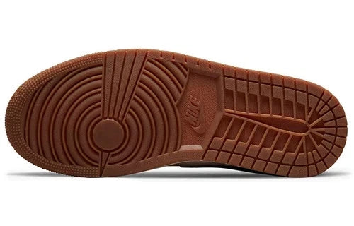 Nike Air Jordan 1 Mid SE sneakers feature a unique color scheme of "Barely Orange," "Pale Ivory," and "Smokey Mauve"