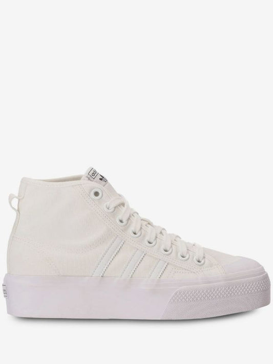 Adidas Nizza Platform Mid sneakers in "Triple White," featuring a thick flatform rubber sole.