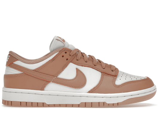 Nike Dunk Low "Rose Whisper" sneakers, featuring a two-tone white and pastel pink leather construction.