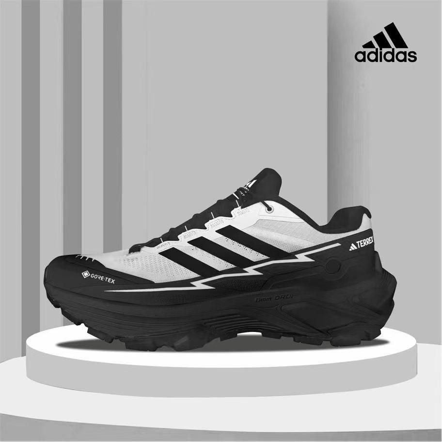 GORE-TEX waterproof membrane and a distinct white and black colorway.