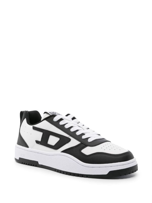 Diesel S-Ukiyo V2 Low sneakers in a white and black colorway featuring the iconic "D" logo patch.