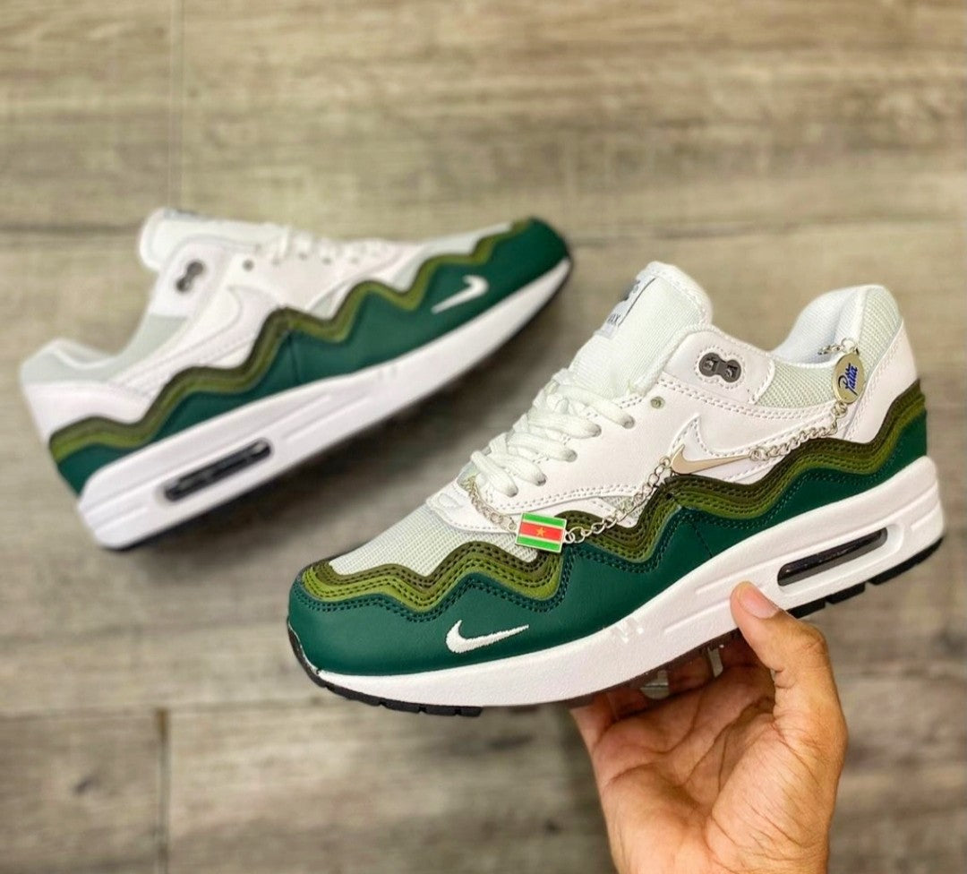 Nike Air Max 1 Patta "Chlorophyll" sneakers, featuring a distinct green wavy mudguard.