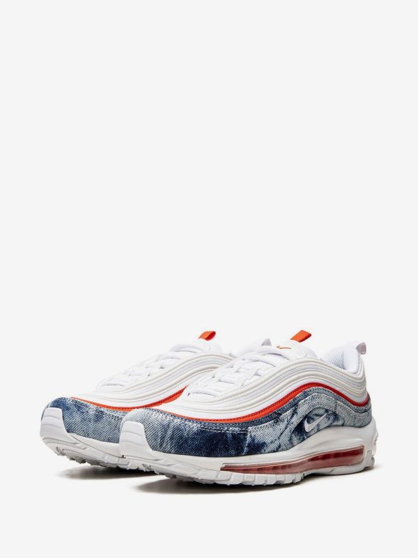 Nike Air Max 97 "Washed Denim Pack" sneakers, recognizable by their unique blue denim texture paired with bright red accents and a white sole.