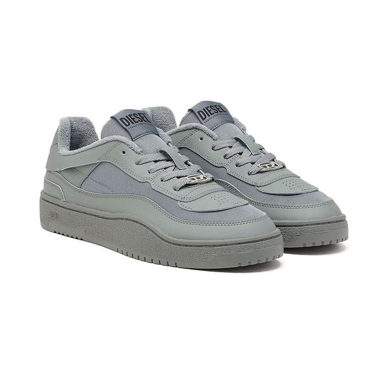 Diesel S-Oval Skate Low sneakers in a grey colorway featuring a distinctive metal D logo charm on the laces.