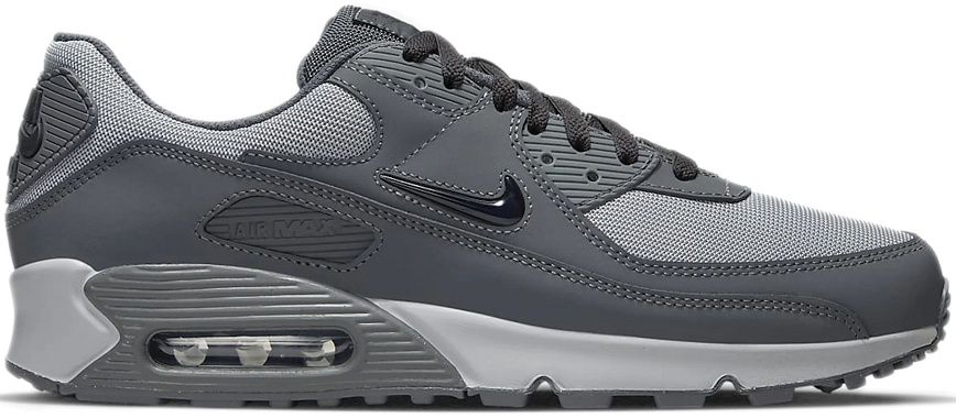 Nike Air Max 90 sneakers featuring a grey and white color scheme.