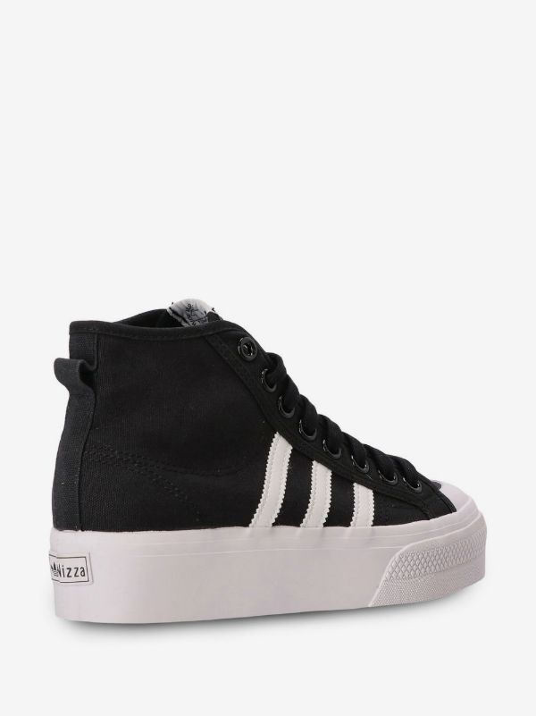 Adidas Originals Nizza Platform Mid sneakers in black with white accents.