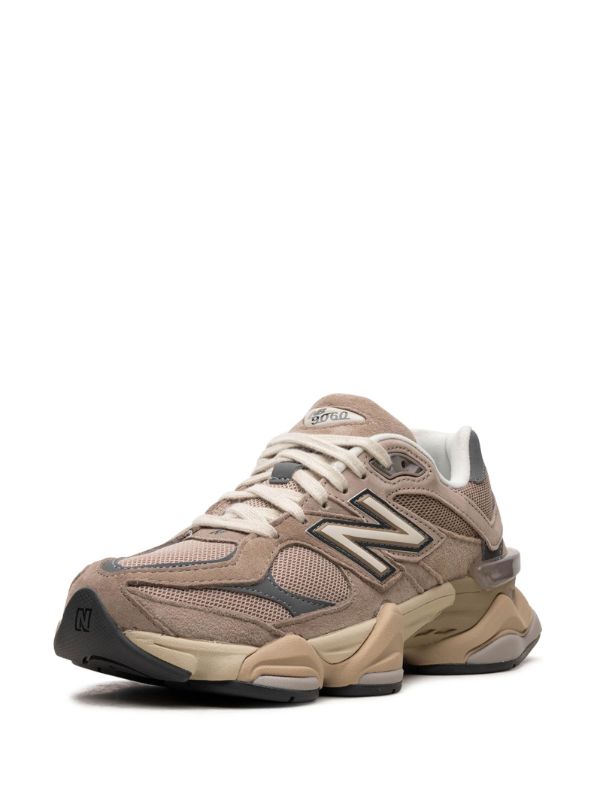 New Balance 9060 in the "Driftwood Castlerock" colorway, featuring a chunky sole and a suede and mesh upper.