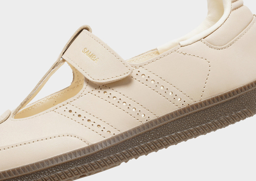 adidas Originals Women's Samba Jane sneakers in a beige or cream colorway, featuring a unique Mary Jane style strap.