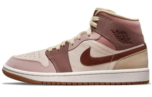 Nike Air Jordan 1 Mid SE sneakers feature a unique color scheme of "Barely Orange," "Pale Ivory," and "Smokey Mauve"
