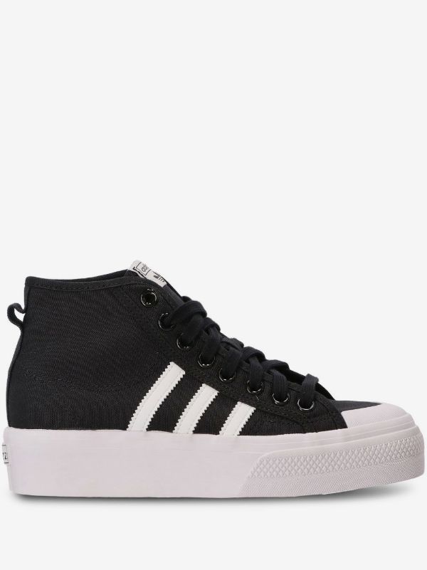 Adidas Originals Nizza Platform Mid sneakers in black with white accents.