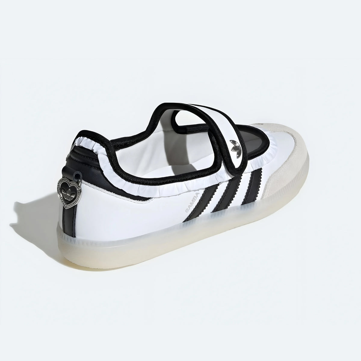 Adidas Samba Jane shoes in a white and black colorway, featuring a unique ruffle trim detail.