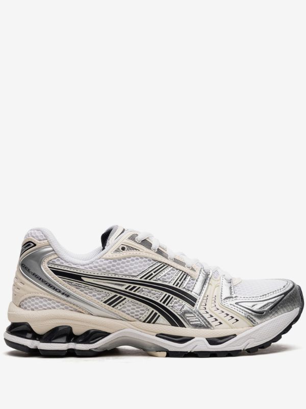 ASICS GEL-KAYANO 14 sneakers in the "White/Midnight" colorway, featuring a late 2000s running aesthetic.