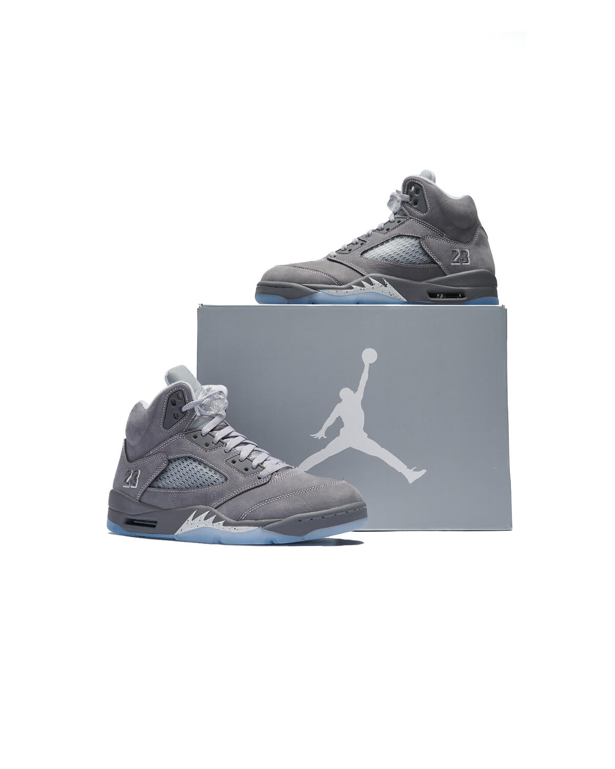 Nike Air Jordan 5 "Wolf Grey" sneakers, recognizable by their light graphite suede upper and translucent icy outsole.