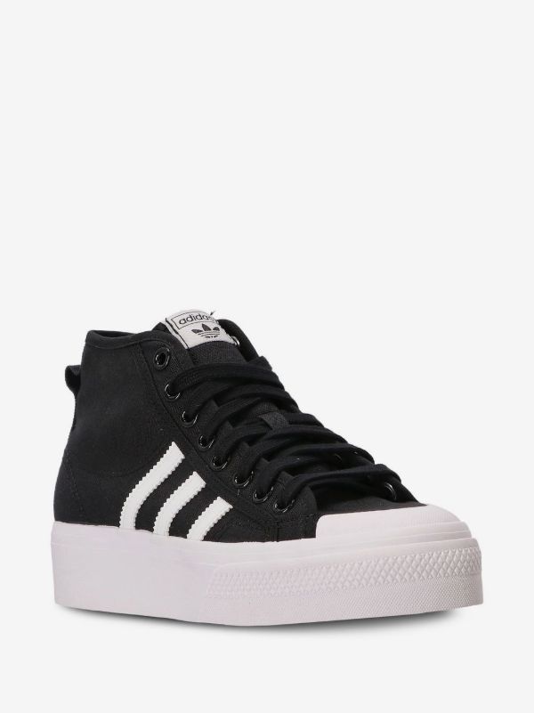 Adidas Originals Nizza Platform Mid sneakers in black with white accents.