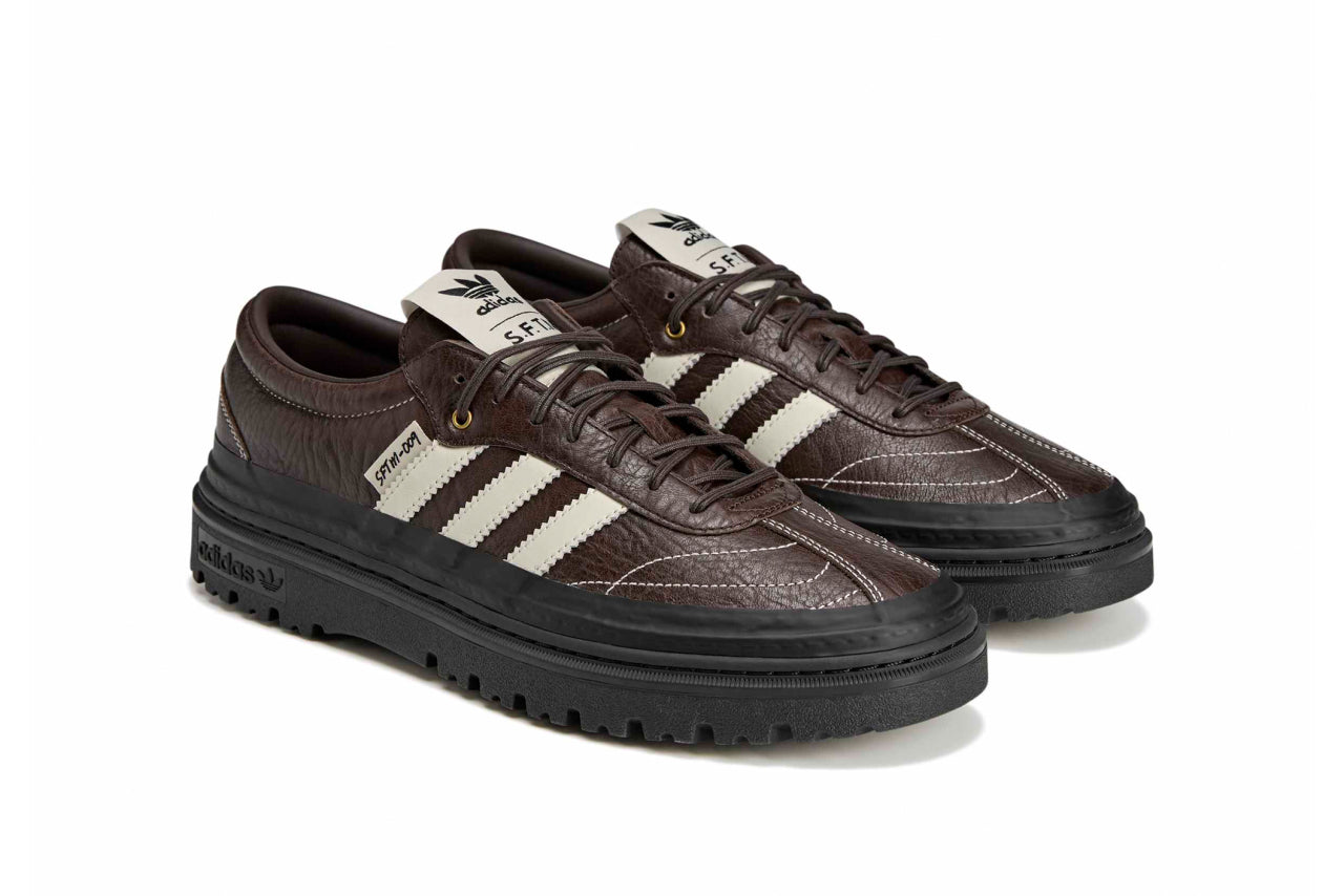 Adidas Samba LX Freizeit sneaker features a dark brown tumbled leather upper and a prominent SFTM-009 tag on the side.