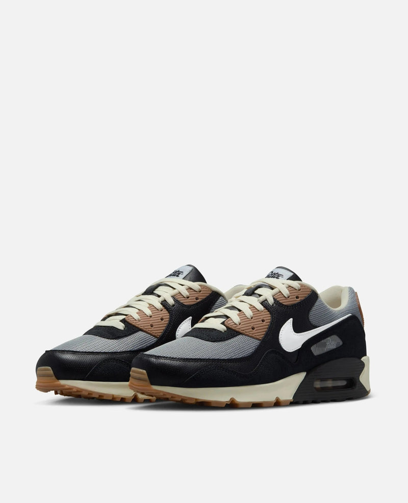 Patta x Nike Air Max 90 SP in the "Black Particle Grey" colorway, featuring a gum rubber outsole.