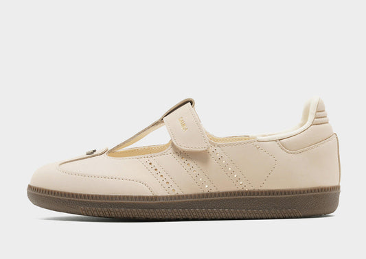 adidas Originals Women's Samba Jane sneakers in a beige or cream colorway, featuring a unique Mary Jane style strap.