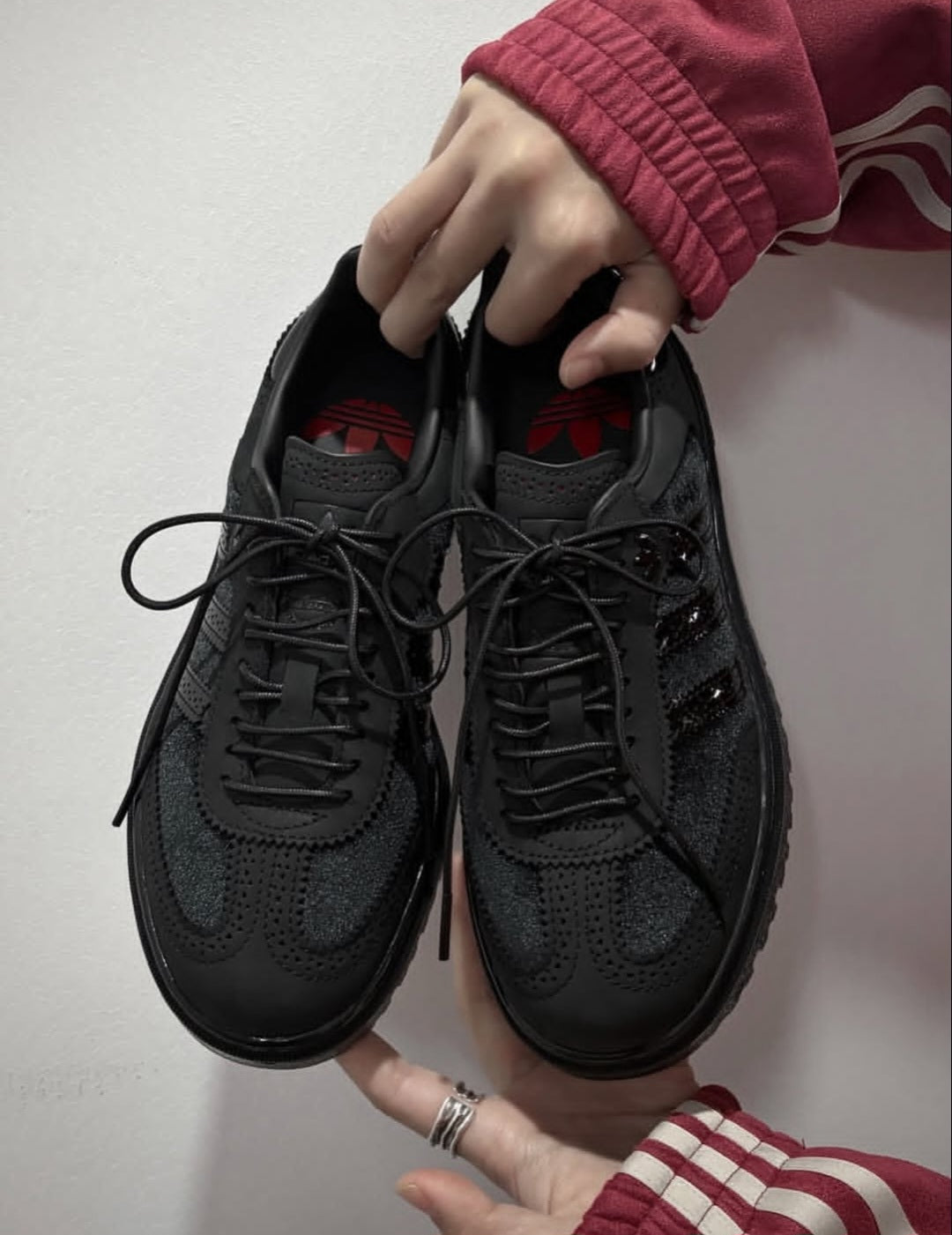Adidas Samba WTR sneakers in black, featuring a textured lug sole and premium paneled design.