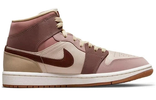Nike Air Jordan 1 Mid SE sneakers feature a unique color scheme of "Barely Orange," "Pale Ivory," and "Smokey Mauve"