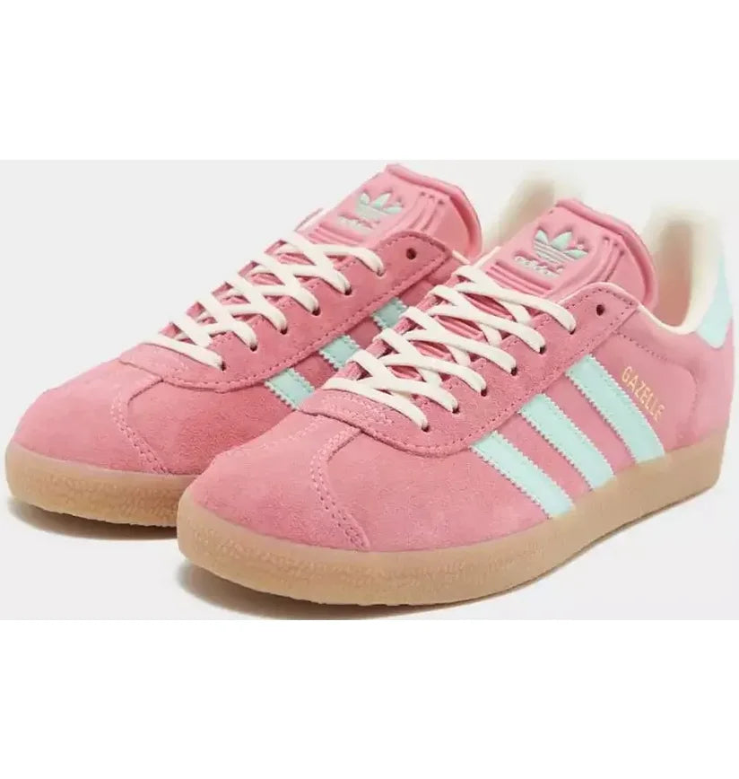 Adidas Gazelle Bold shoes featuring a vibrant pink suede upper and light green stripes.