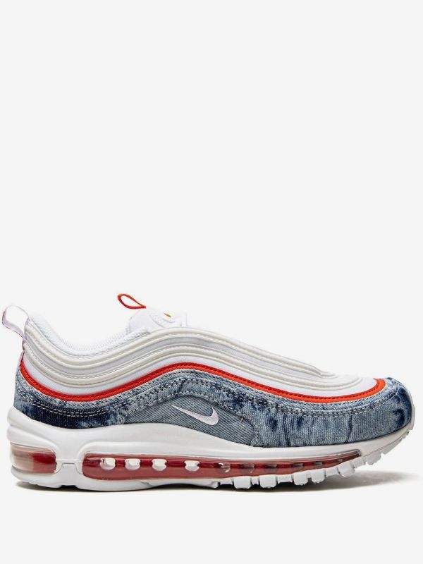 Nike Air Max 97 "Washed Denim Pack" sneakers, recognizable by their unique blue denim texture paired with bright red accents and a white sole.