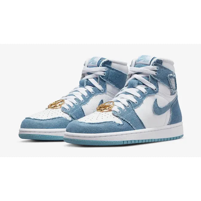 Women's Air Jordan 1 Retro High OG "Denim" sneakers, featuring frayed blue denim overlays on a white leather base and metallic gold lace dubraes.