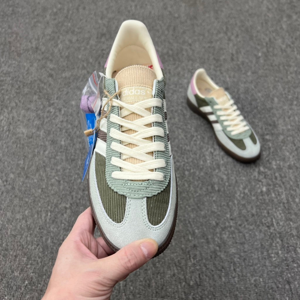Adidas Handball Spezial sneakers in the "Silver Green/Magic Mauve" colorway, featuring a unique olive corduroy upper.