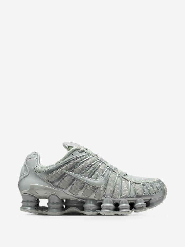 Nike Shox TL sneakers in a Wolf Grey or Pure Platinum/Chrome colorway.
