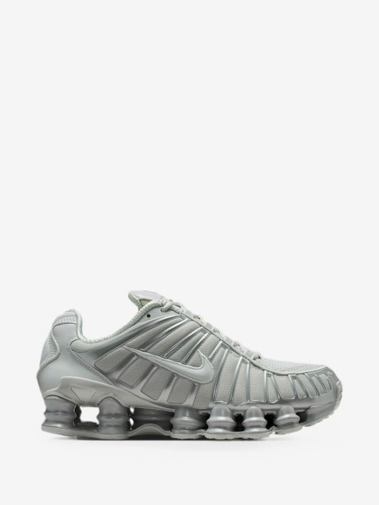 Nike Shox TL sneakers in a Wolf Grey or Pure Platinum/Chrome colorway.