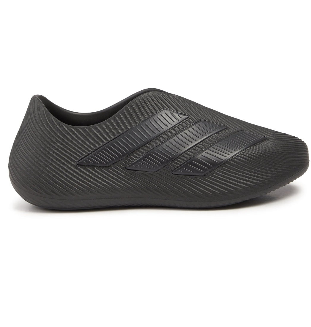 Adidas Purechill Slides in Core Black, featuring a sleek, all-black design with a textured upper and EVA midsole.