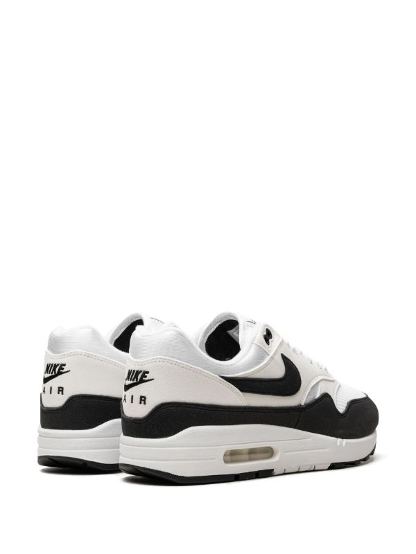 Nike Air Max 1 "Panda" sneakers in white and black with a panelled mesh upper and signature Swoosh logo.