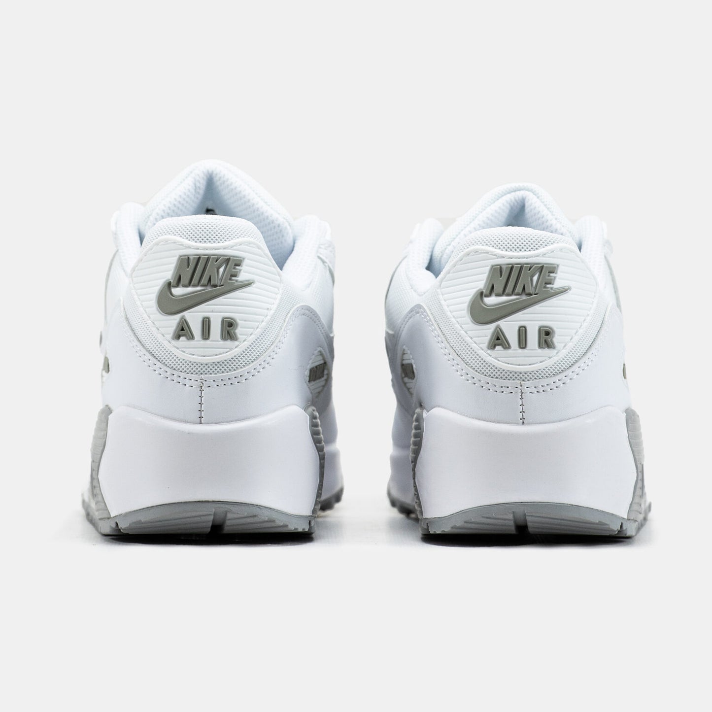 Nike Air Max 90 sneakers featuring a distinct jewel Swoosh on the side.