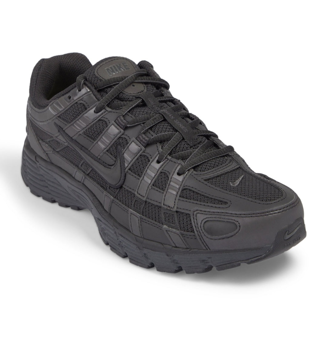 Nike P-6000 sneakers in a triple-black colorway, featuring a mix of breathable mesh and synthetic leather overlays.Design Inspiration: